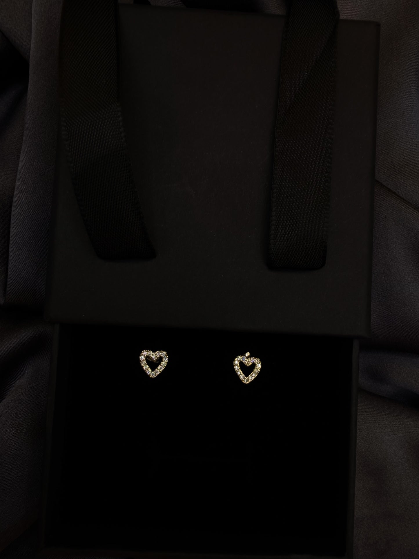 Luxenor Heart Glow Stud Earrings