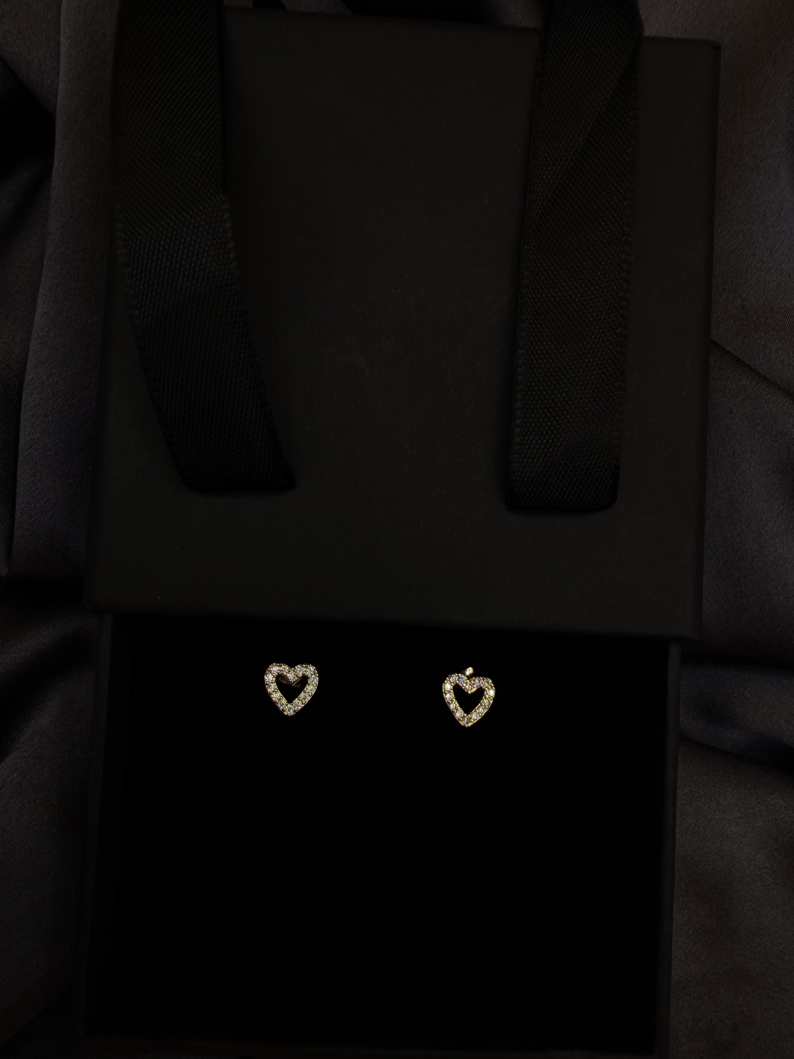 Luxenor Heart Glow Stud Earrings